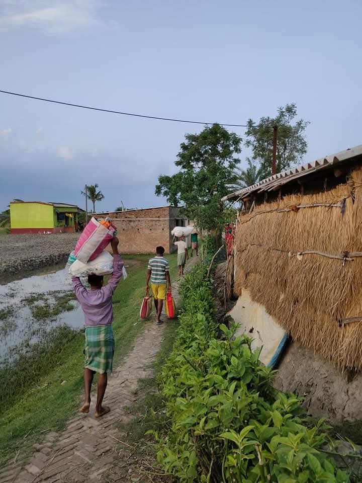 Cyclone Amphan relief — families receiving aid